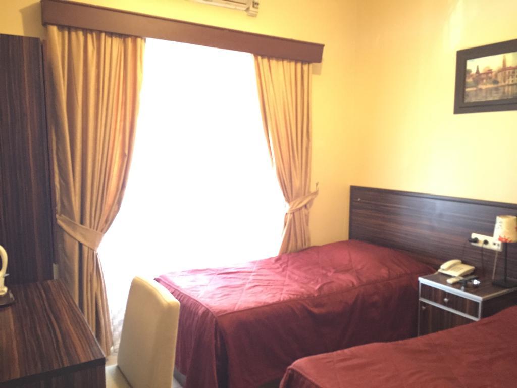 Hotel Mercan Adana Habitación foto